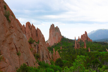 Garden of the Gods national park in the spring with lush green forest trees in Colorado Springs, CO USA. - 616876236