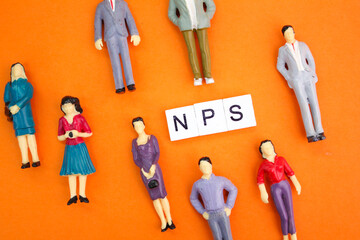 letters of the alphabet NPS as NET PROMOTER SCORE. Business development concept. business or...