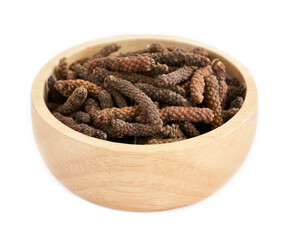 long pepper or piper longum in wood plate isolated on white background. heap of long pepper or piper longum isolated. long pepper, piper longum                               