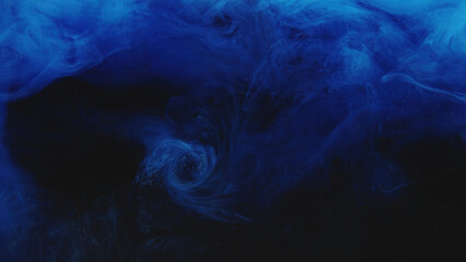 Ink water swirl. Color smoke cloud. Night haze. Blue fume cloud explosion wave texture on dark...