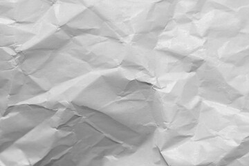 White crumpled and creased paper poster background.