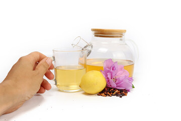 feminine hand taking a cup of tea