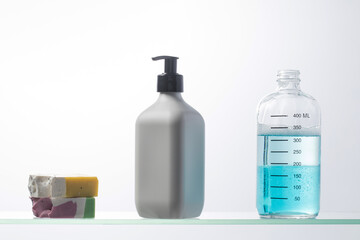 A mockup of a white dispenser with a cosmetic product for skin care of the face and body. Shower gel, facial cleanser.
