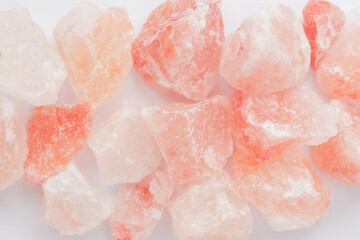 Top view of himalayan crystals salt on white