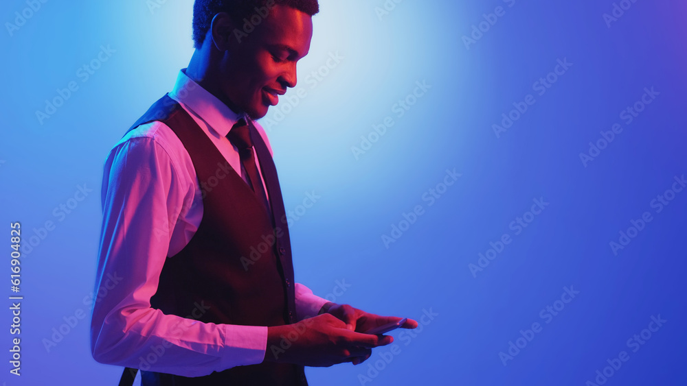 Wall mural business chat. mobile app. digital communication. pink neon light smiling man texting message using 