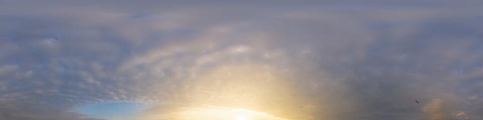Sunset sky panorama with dramatic bright glowing pink Cumulus clouds. HDR 360 seamless spherical panorama. Full zenith or sky dome for 3D visualization, sky replacement for aerial drone panoramas.