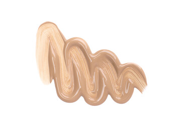 Smudged beige foundation cream isolated on white
