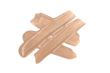 Smudged beige foundation cream isolated on white