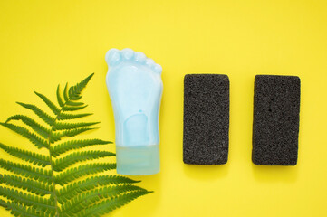 Tube-container for cosmetic foot cream. Concept of natural cosmetics and skin care. Set of pedicure tools. Studio shot with copy space, empty, unfilled