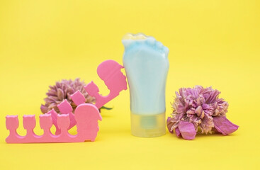 Tube-container for cosmetic foot cream. Concept of natural cosmetics and skin care. Set of pedicure tools. Studio shot with copy space, empty, unfilled