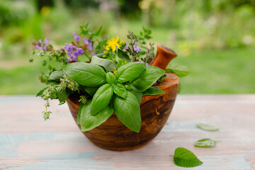 fresh herbs in a mortar