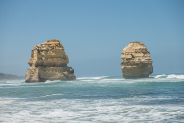 Twelve apostles rock formations at the great ocean road in sunny weather with a blue sky, Victoria, Australia 