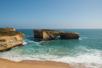 London bridge rock formation at the great ocean road in sunny weather with a blue sky, Victoria, Australia 