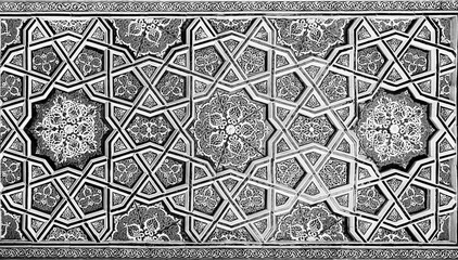 Geometric traditional Islamic ornament. Fragment of a ceramic mosaic. Black and white.