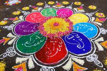 Colourful Rangoli Design is an art form made during using powder colours during Diwali, Onam, Pongal, Hindu festivals in India.
