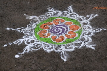 Colourful Rangoli Design is an art form made during using powder colours during Diwali, Onam, Pongal, Hindu festivals in India.