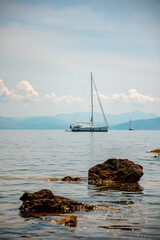 Fototapeta premium Yacht in the bay. Corfu. Greece.