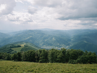 Obraz premium Enchanting Summer Landscape of Carpathian Mountains in Mist