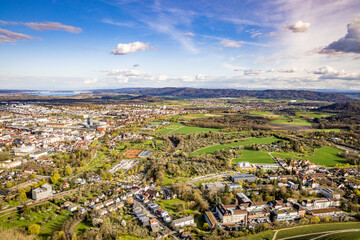 Fototapeta premium Bird's-eye view of the city of Singen against the backdrop of the Lake Constance