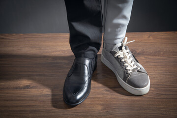 Fototapeta na wymiar Work Life Balance Concept. Business and casual shoes