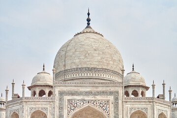 Close up Taj Mahal dome white marble mausoleum landmark in Agra, Uttar Pradesh, India, beautiful...