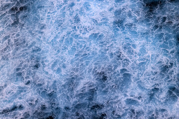 sea waves foam drone view abstract background ocean top