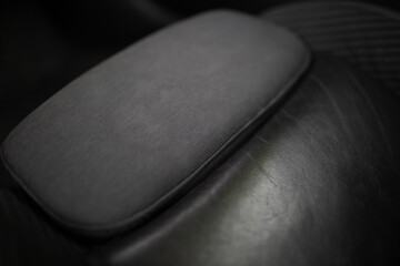 Grey alcantara texture. Close up car seat fabric material. Surface of leatherette for textured background. 