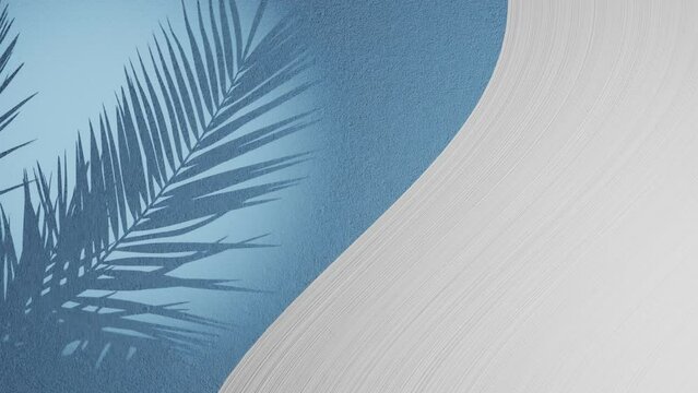 White plaster wave by light blue texture background with palm frond shadow