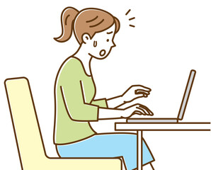 パソコンで作業でミスをした若い女性