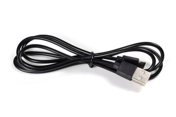 Close-up of a USB cable with standard A and micro-USB standard B connectors isolated on a white background.