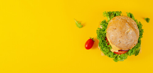 Delicious Burger with Vegetables and Sauce, Fresh and Tasty Plant Based Meatless Burgers on Yellow Background
