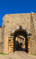 Volterra, Italy. Arched gates (Porta all'Arco, IV-III century BC - I century BC). Three stone heads presumably depict Etruscan or Roman gods