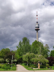 Naklejka premium Danube Tower in Vienna seen from the Danube park