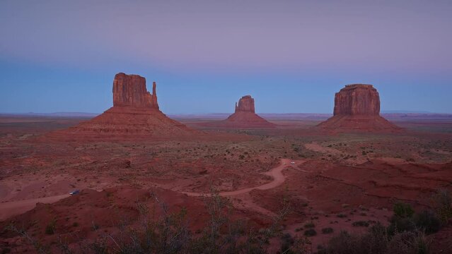 Timelapse in Monument Valley with sandstone buttes - Navajo nation at sunset - Driving valley drive in Arizona sightseeing detours