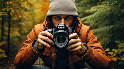 Woman photographer day. Man wearing hat holding camera in hands