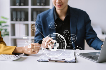 Person typing laptop computer and tablet with SDK icon on virtual screen. SDK Software development kit programming language technology concept in office.