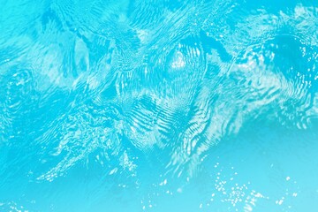 Fototapeta na wymiar Blue abstract background, blue water splash