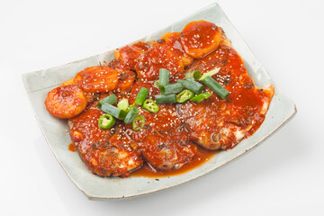 A side dish made by boiling dried fish with seasonings such as soy sauce.