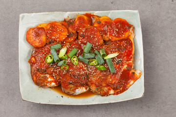 A side dish made by boiling dried fish with seasonings such as soy sauce.