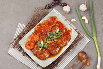 A side dish made by boiling dried fish with seasonings such as soy sauce.