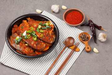 A side dish made by boiling dried fish with seasonings such as soy sauce.