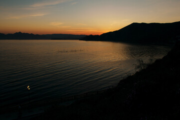 Obraz premium Sunset moody night seascape with a view on the bay.