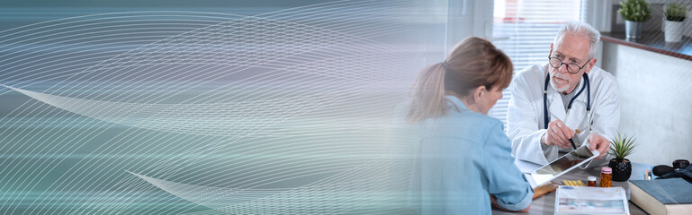 Fototapeta premium Doctor showing reports on digital tablet to his female patient; panoramic banner