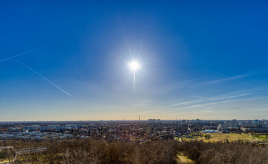 aerial view of berlin marzahn with clear blue sky and sun star