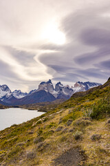 Panorama with cloud formation from Torres del Paine mountain massif at Lake Pehoe, Chile, Patagonia