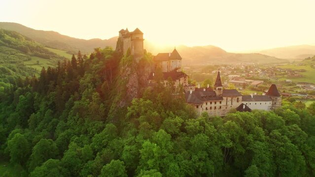 Medieval Oravsky Hrad castle at sunrise in Slovakia. Aerial view