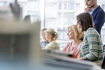 Business people working at desk in office