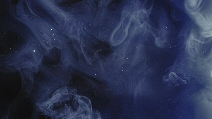 Paint splash. Star cloud. Ink water. Magic night sky. Blue color glitter dust particles mist spreading motion on dark abstract art opener background.