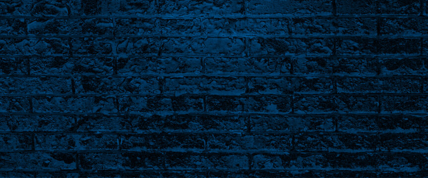 Background and texture of dark blue brick wall, brick wall for design, empty background of old brick wall, background, neon light, background of old vintage dark blue brick wall.
