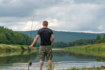 Shore fishermen summer activity fishing rod waiting to catch fish, fun day fresh water 